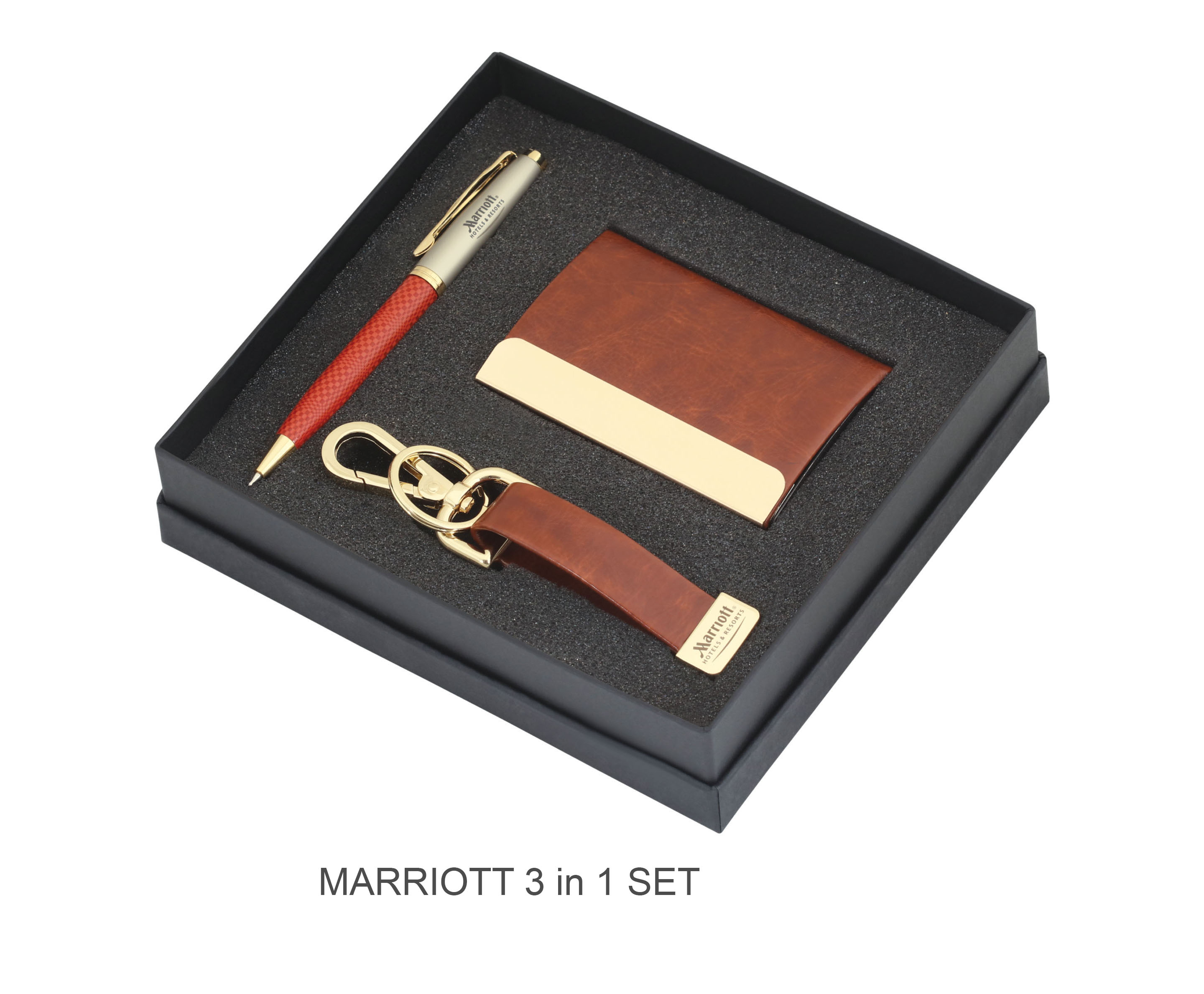 a businesses gift set pen, keychain and visiting card